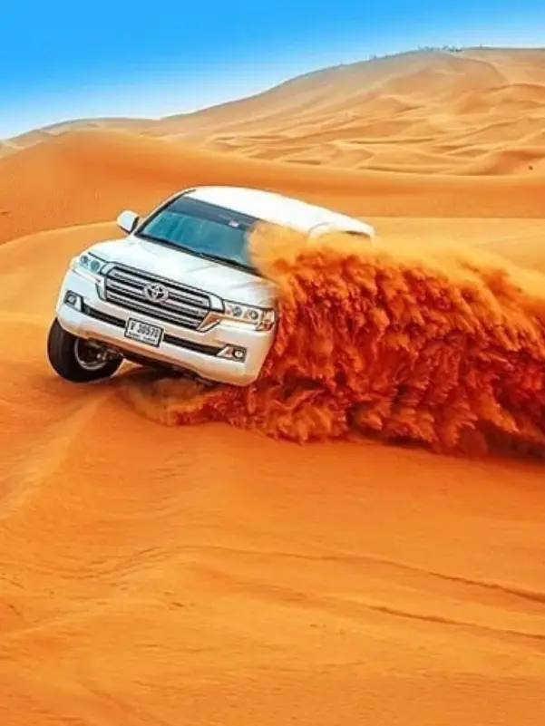 Car drifting in desert sand