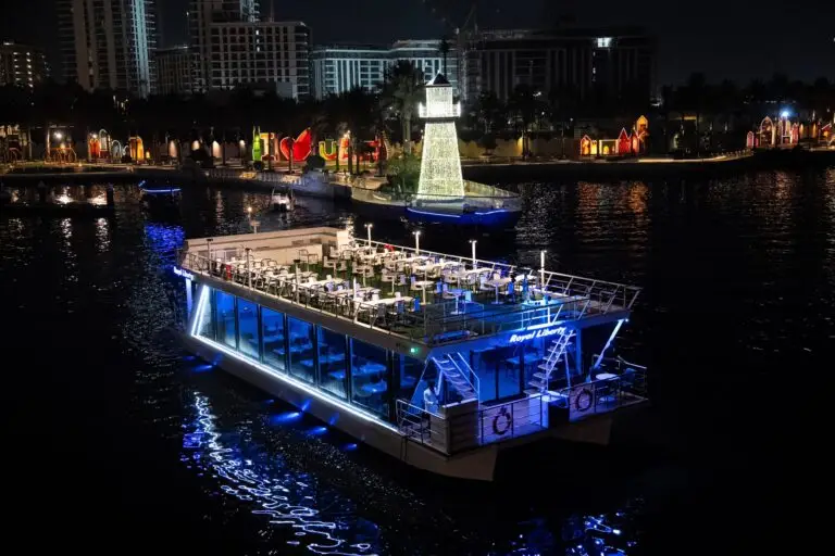 Luxury Dubai Marina Dhow Cruise Yacht with Rooftop Dining and LED Lights at Night