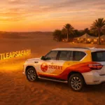 Nissan Patrol SE 2024 Desert Leap Safari vehicle parked on Dubai desert dunes at sunset