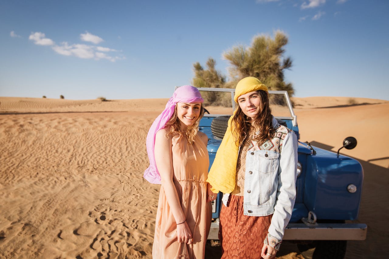4x4 vehicle dune bashing on the red dunes during the best desert safari in Duba