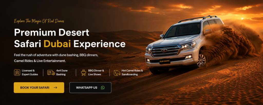 4x4 Land Cruiser dune bashing across Dubai's red desert dunes during a desert safari adventure