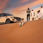 Family enjoying desert activities together