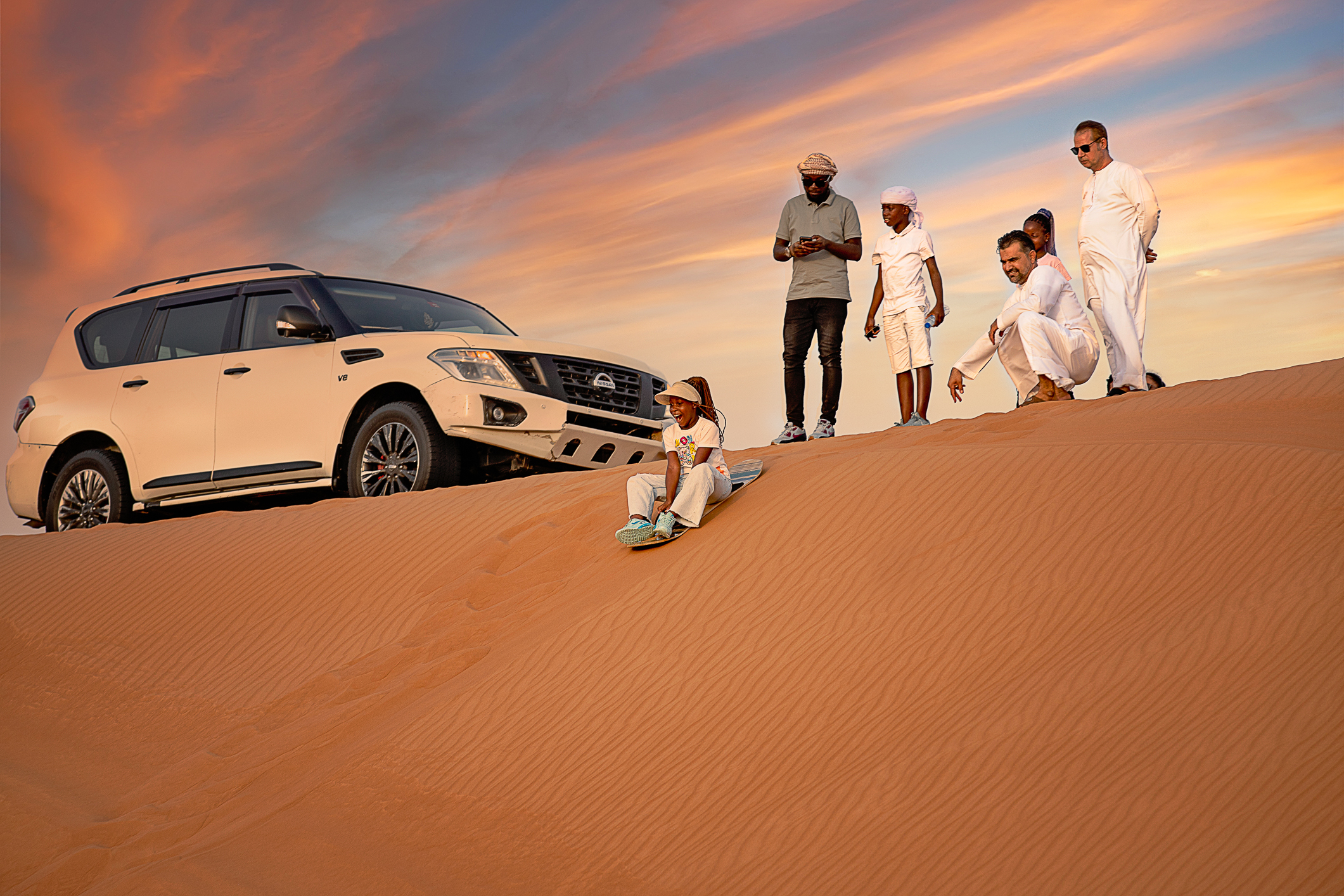Sandboarding during Desert Safari Dubai