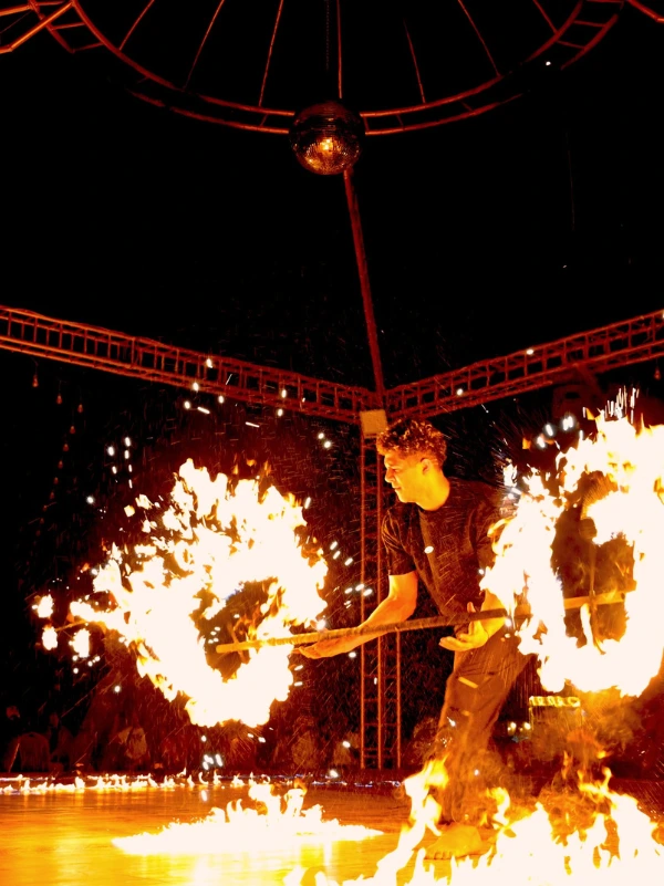 Fire show performance at a desert safari camp in Dubai at night