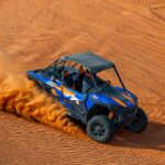 Book Desert Safari Dubai with dune bashing, quad biking, camel rides, BBQ dinner, and Red Dunes adventure experiences