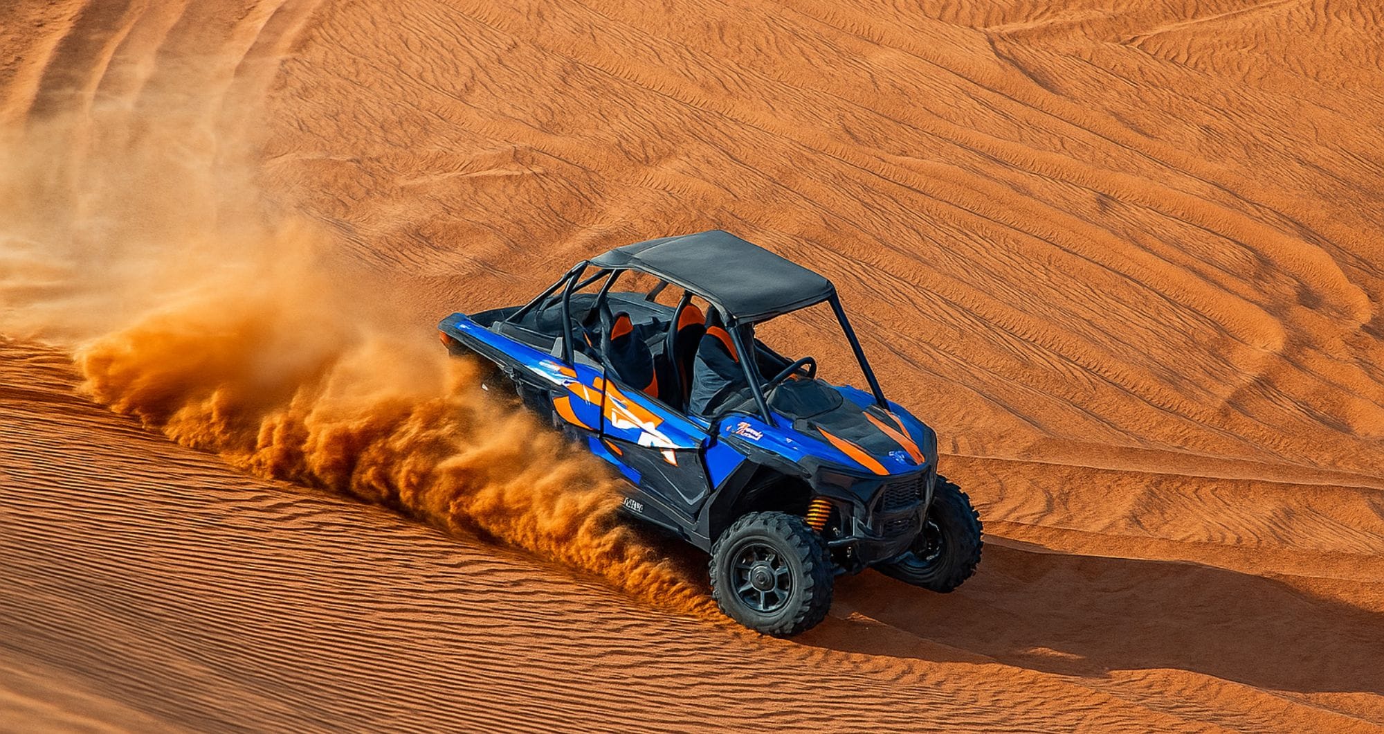 Book Desert Safari Dubai with dune bashing, quad biking, camel rides, BBQ dinner, and Red Dunes adventure experiences