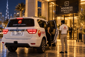 Desert Leap Safari Nissan Patrol outside a Downtown Dubai hotel at night
