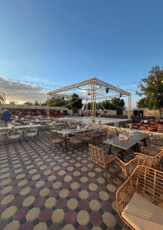 Premium desert safari camp with Arabian seating and entertainment area in Dubai