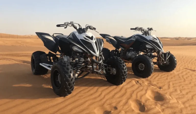 Raptor 700CC Yamaha quad bike rider in the Dubai desert